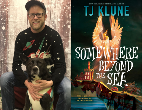 Author T J Klune posing with black and white dog and cover of book Somewhere Beyond the Sea