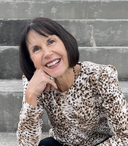 image of woman with bob haircut smiling at the camera